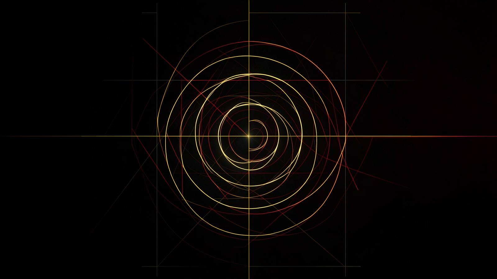 Golden ratio spiral and geometric composition grids glowing on a dark background